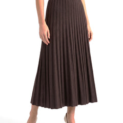 Women's elastic-waist flared midi skirt in coffee brown, worn with cream heels