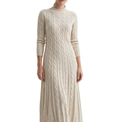 Bridget-Opal Women's Cable-Knit Sweater Maxi Dress in Apricot worn by a model, studio shot on white
