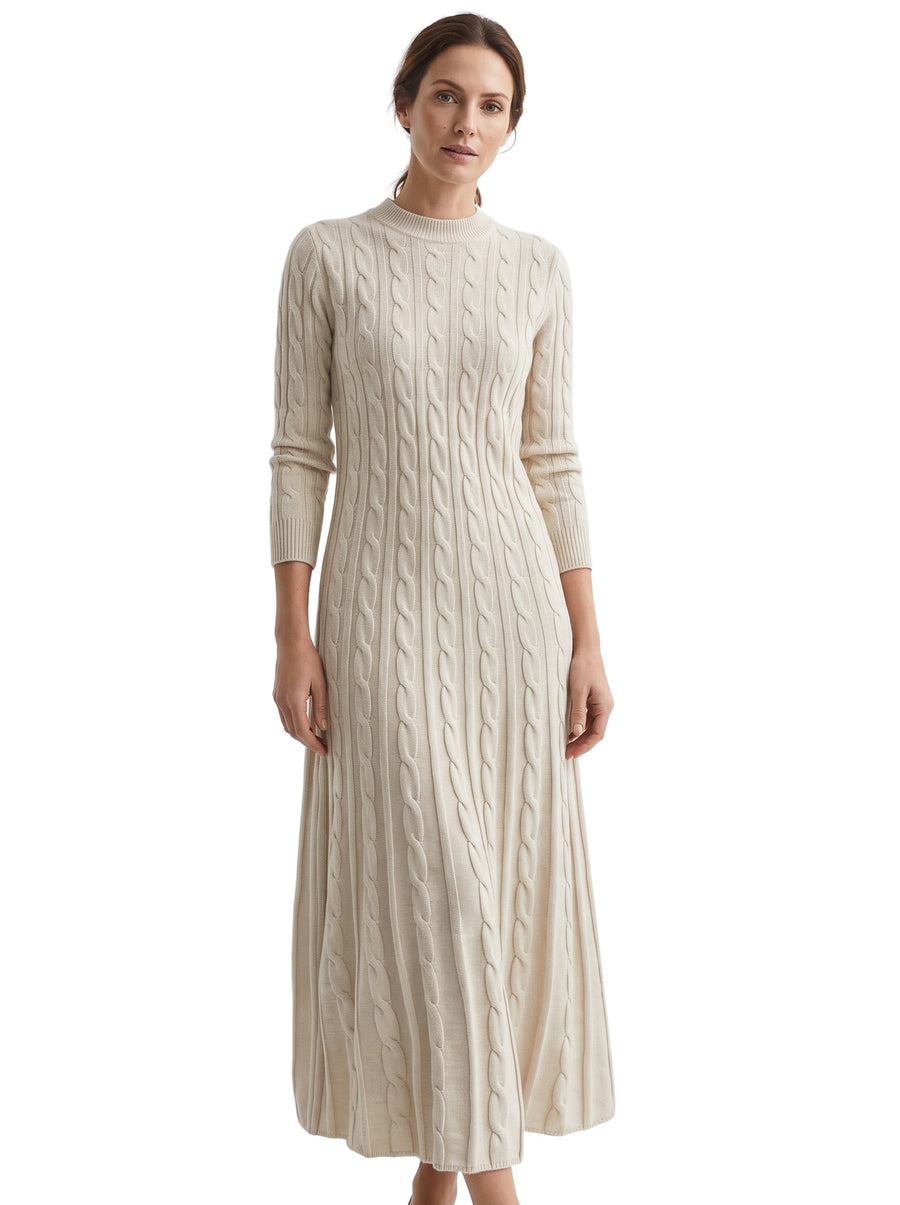 Bridget-Opal Women's Cable-Knit Sweater Maxi Dress in Apricot worn by a model, studio shot on white