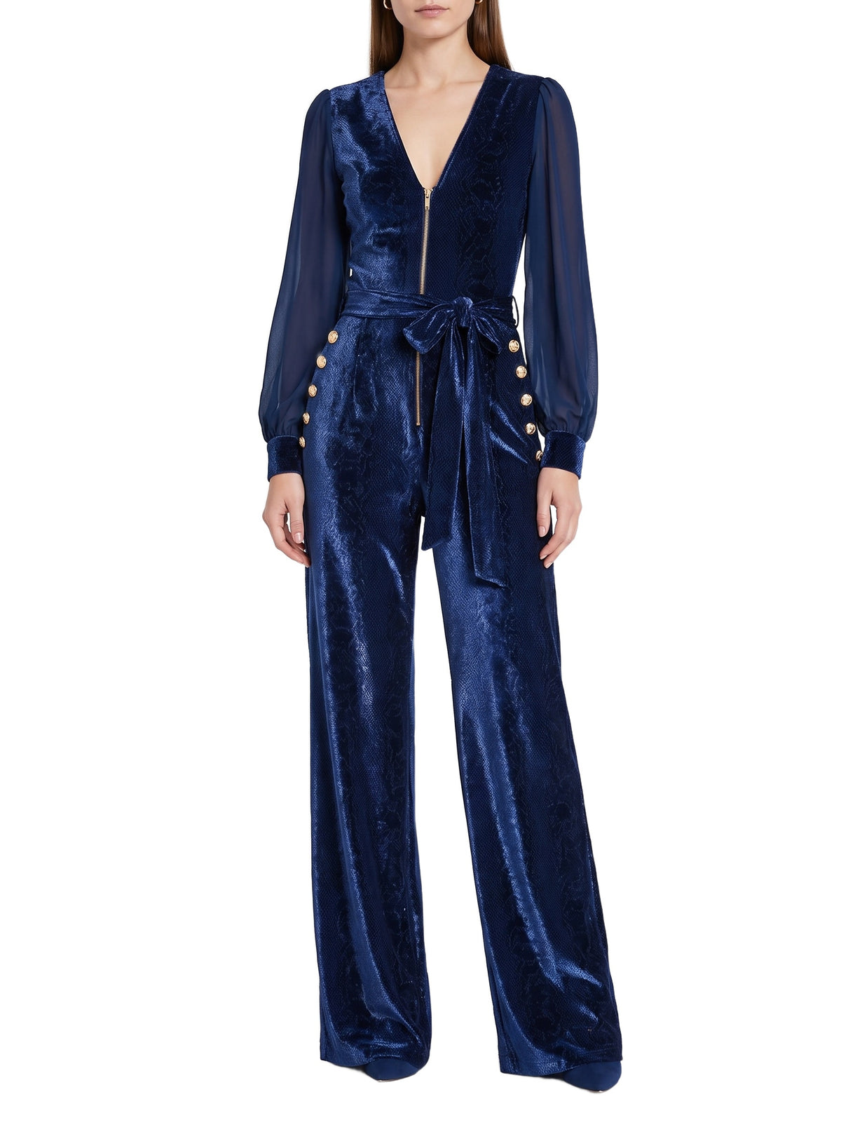 Sabine women's sheer-sleeve velvet wide-leg jumpsuit in dark blue, worn by a model on a white background
