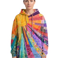 Ophelia-Sigrid Women's Oversized Drawstring-Hood Pullover Hoodie in multicolour sun patchwork print, worn by a model