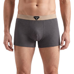 Meredith-Harriet Men's Waffle-Knit Cotton Boxer Briefs in grey with tan waistband worn by a model
