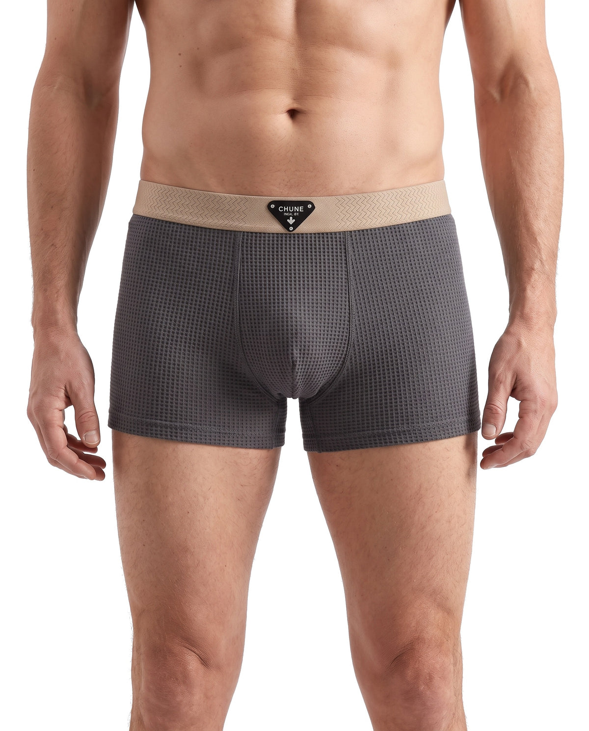 Meredith-Harriet Men's Waffle-Knit Cotton Boxer Briefs in grey with tan waistband worn by a model