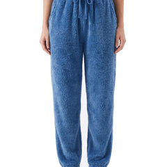 Women's soft fleece straight-leg pants in blue worn by a model, waist to feet studio shot