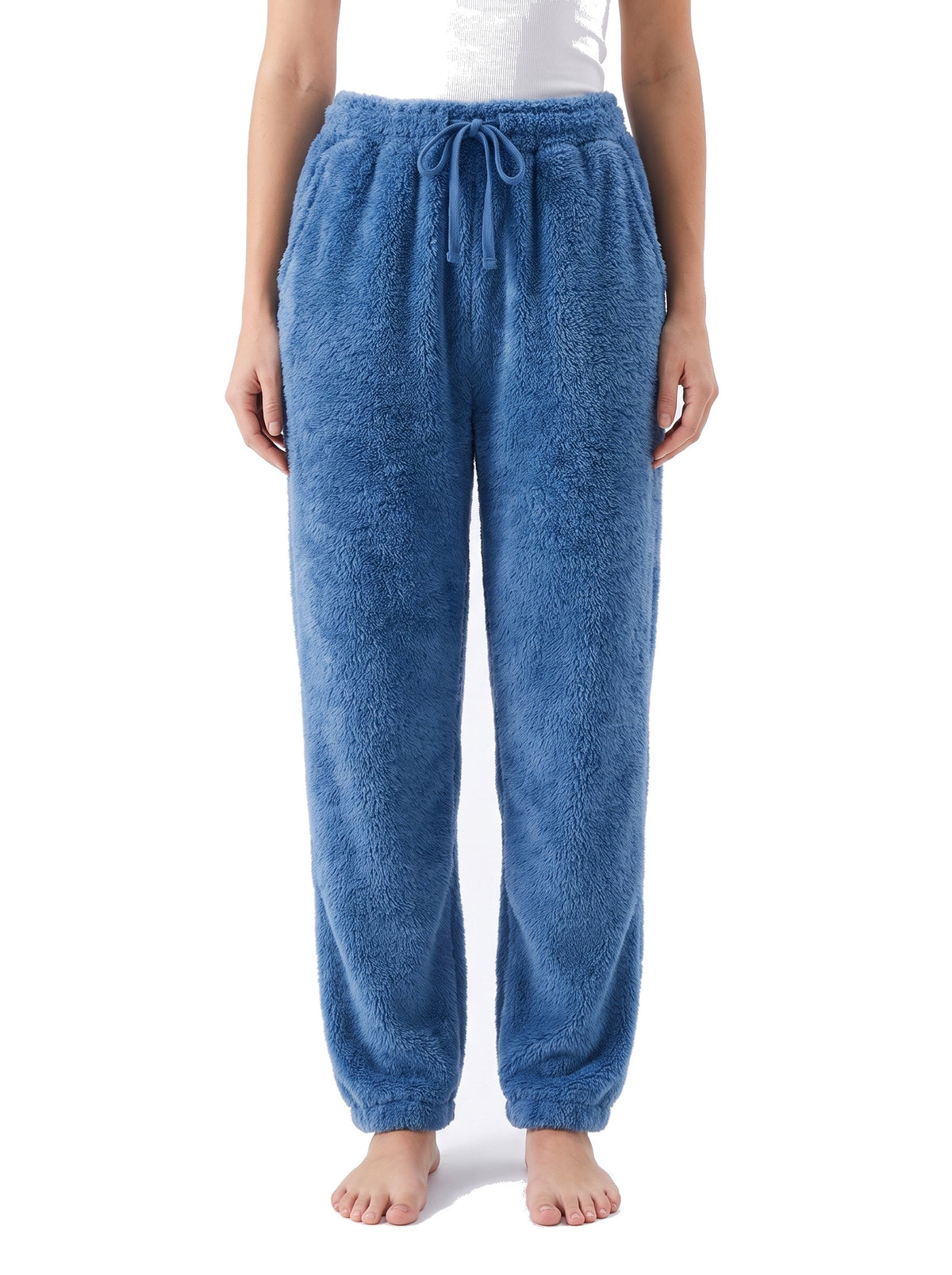 Women's soft fleece straight-leg pants in blue worn by a model, waist to feet studio shot