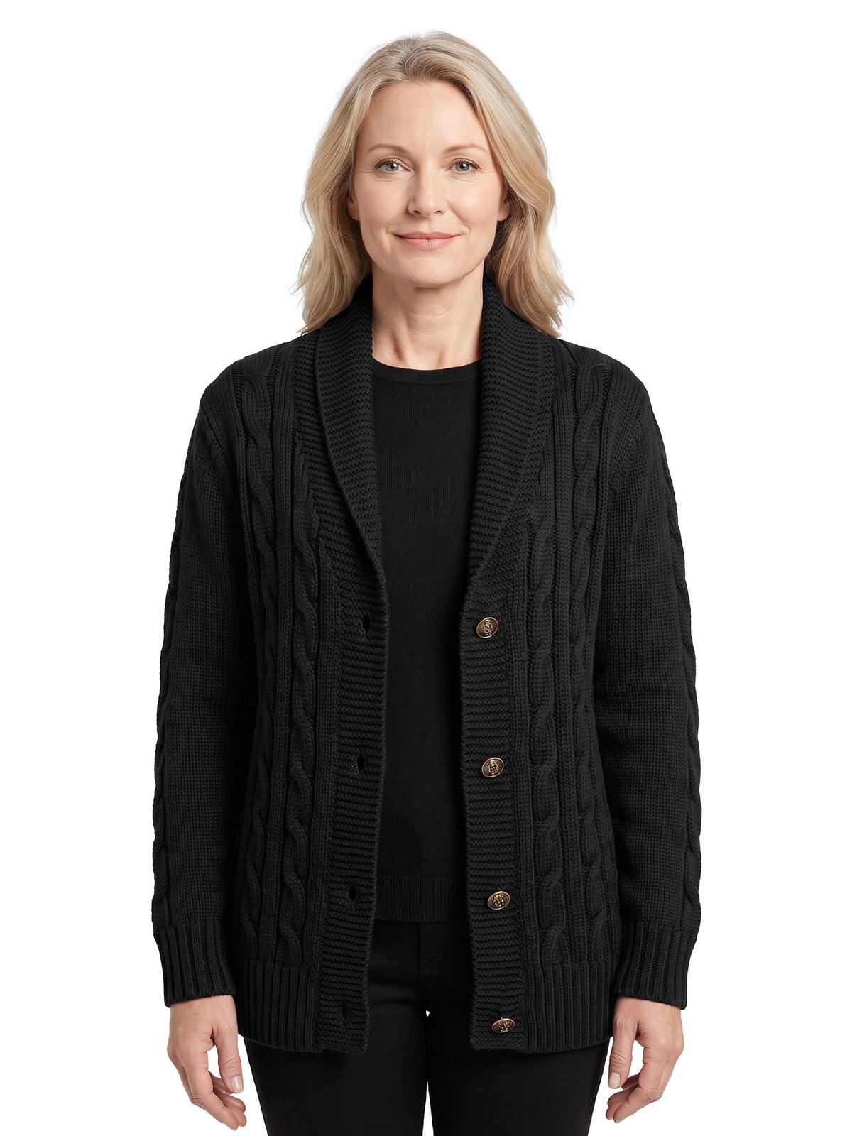 Women's chunky cable-knit black button cardigan worn by a model