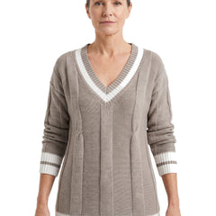 Woman wearing the Alba-Carmen soft knit V-neck sweater in taupe and white